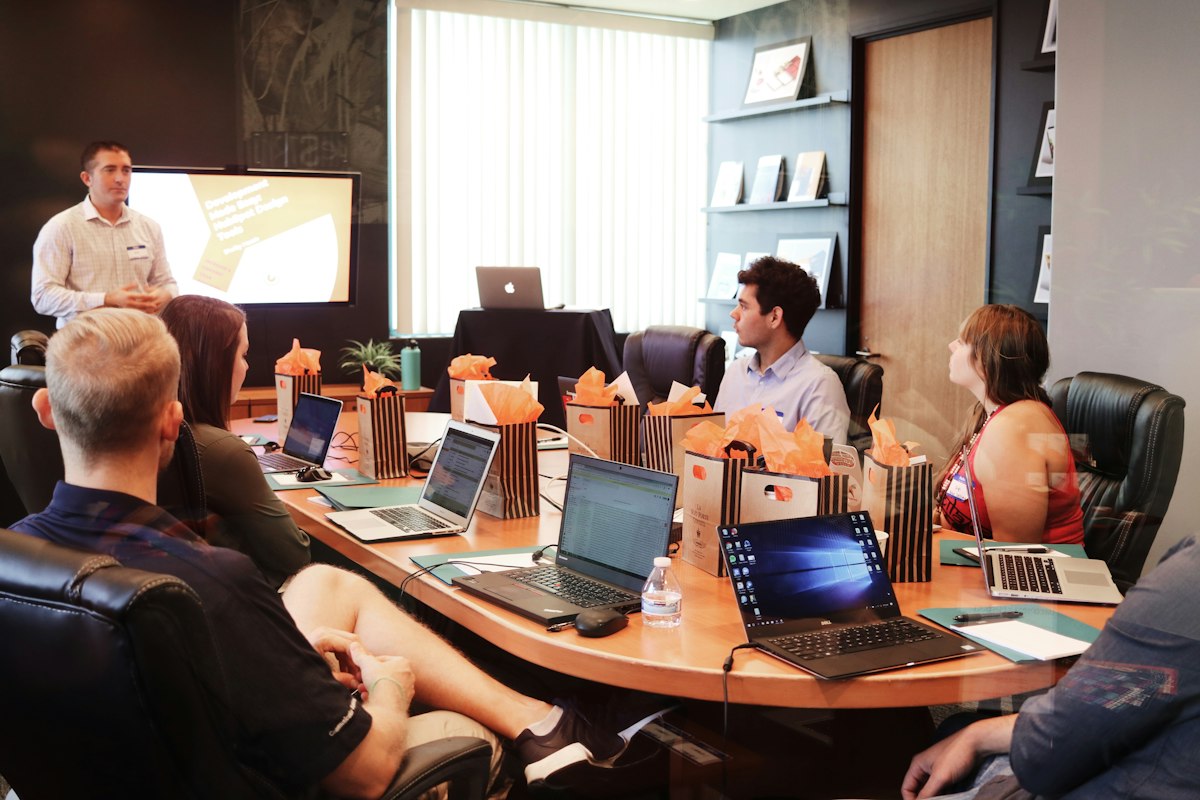 Team reviewing a presentation in a meeting room
